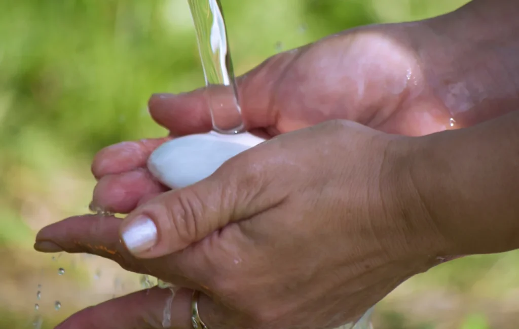 wash hands with soap and water,